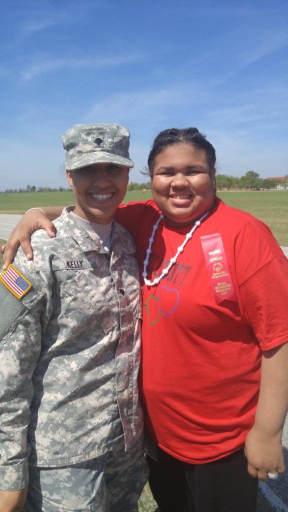 hugging a friend while in the military